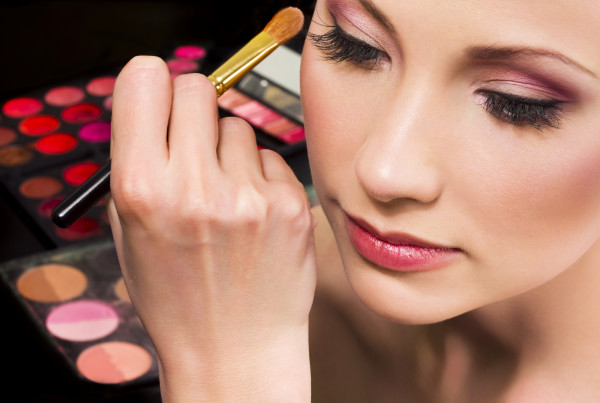 Makeup artist applying eyeshadow