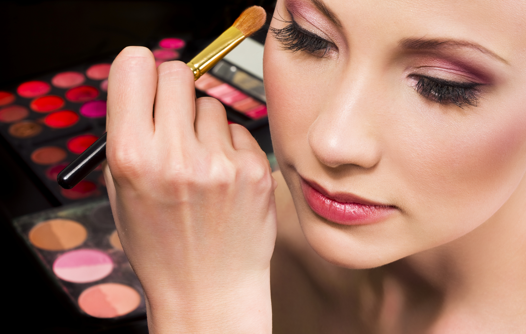 Makeup artist applying eyeshadow